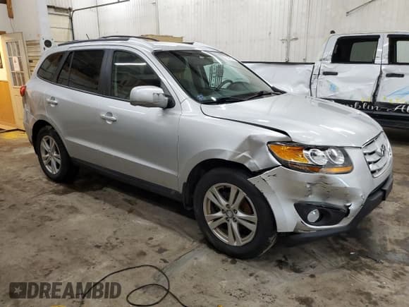 ✅ 2011 Hyundai Santa Fe SE • VIN: 5XYZHDAG1BG049496 • Lot: 77845194. Listed on Copart with 193,323 mi. Free auction sales archive from the USA and detailed vehicle history report at DreamBid. Image 4.