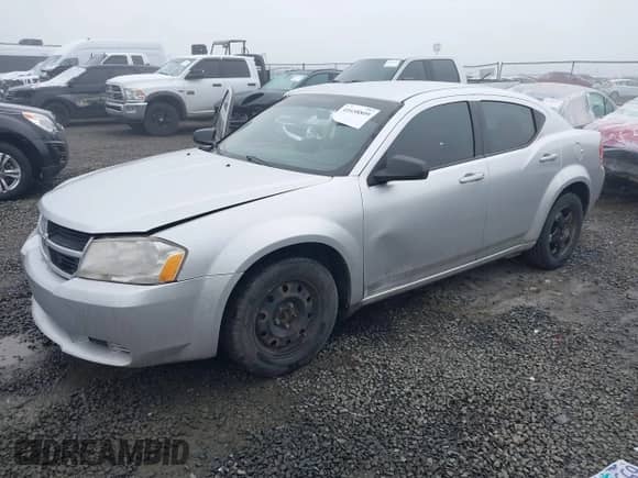 2010 Dodge Avenger SXT with VIN 1B3CC4FD8AN195602, listed as a IAAI auction lot 41658809 with 172,629 mi miles and . Bid and sale history available at DreamBid. Image 2.