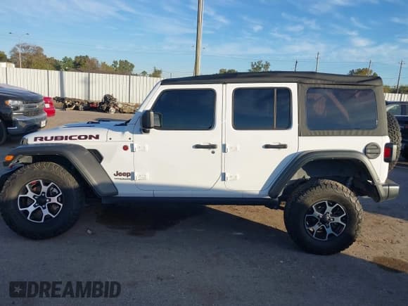 ✅ 2022 Jeep Wrangler Unlimited Rubicon • VIN: 1C4HJXFN4NW123803 • Lot: 40994742. Listed on IAAI with 36,156 mi. Free auction sales archive from the USA and detailed vehicle history report at DreamBid. Image 14.