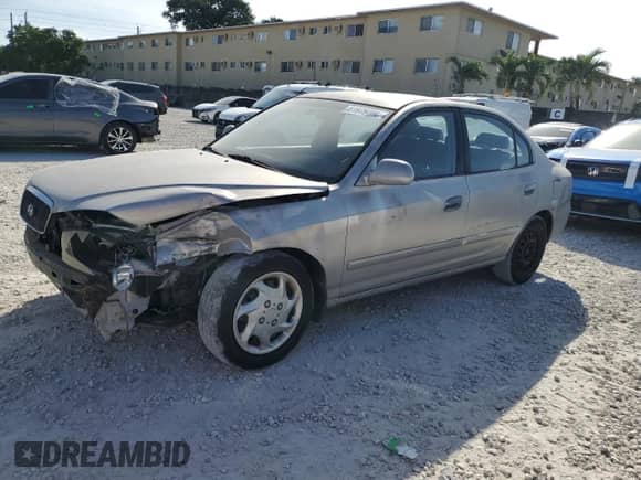 2003 Hyundai Elantra GLS z VIN KMHDN45D33U536214, wystawiony jako Copart lot #81979704 z przebiegiem 157 515 mil mil oraz Szkoda całkowita • Salvage title. Historia ofert i sprzedaży dostępna na DreamBid. Obrazek 1.