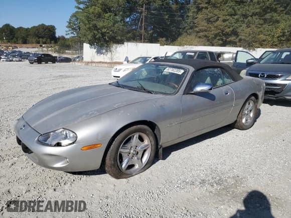 ✅ 1999 Jaguar XK • VIN: SAJGX2041XC040090 • Lot: 82702205. Listed on Copart with Not provided. Free auction sales archive from the USA and detailed vehicle history report at DreamBid. Image 1.