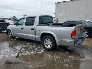 ✅ 2002 Dodge Dakota Sport • VIN: 1B7HL38X12S545810 • Lot: 80880884. Wystawiony na Copart z przebiegiem 161 245 mil. Bezpłatny archiwum sprzedaży aukcyjnych z USA i szczegółowy raport historii pojazdu na DreamBid. Zdjęcie 2.