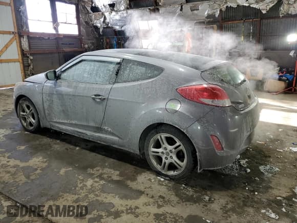 ✅ 2013 Hyundai Veloster w/Black Int • VIN: KMHTC6AD2DU172999 • Лот: 87945825. Опубликован ранее на Copart с пробегом 111 808 миль. Бесплатный доступ к архиву аукционных продаж из США и подробный отчёт об истории автомобиля на DreamBid. Изображение 2.