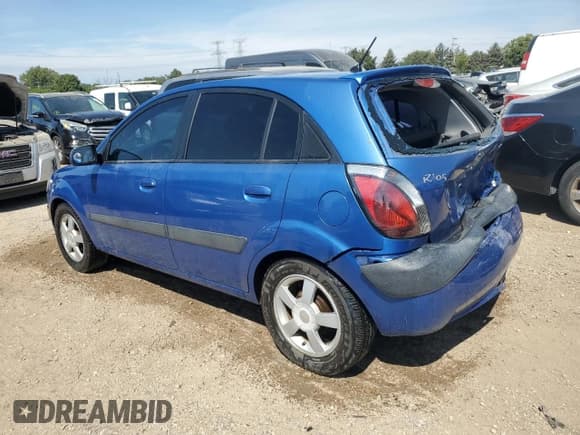 ✅ 2006 Kia Rio SX • VIN: KNADE163966088172 • Lot: 70260074. Listed on Copart with 127,059 mi. Free auction sales archive from the USA and detailed vehicle history report at DreamBid. Image 2.