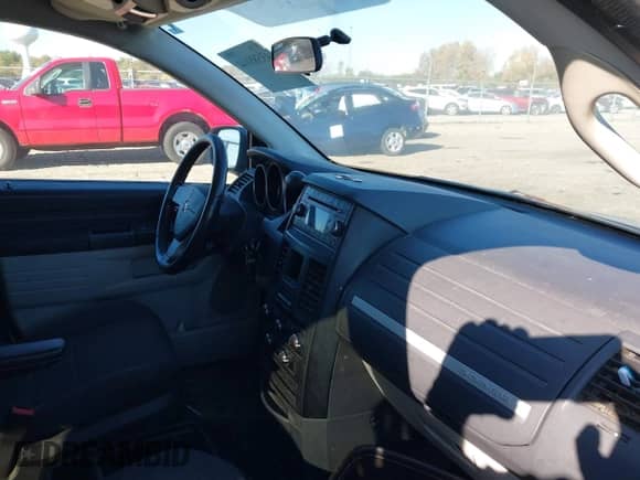 2008 Dodge Grand Caravan SE with VIN 2D8HN44H48R798047, listed as a IAAI auction lot 43588144 with 213,773 mi miles and . Bid and sale history available at DreamBid. Image 5.