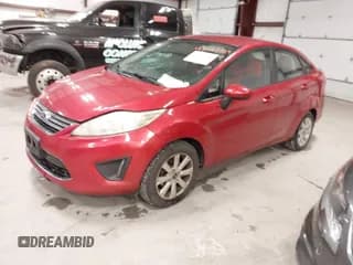 ✅ 2012 Ford Fiesta SE • VIN: 3FADP4BJ9CM153302 • Lot: 43467085. Wystawiony na IAAI z przebiegiem 180 323 mil. Bezpłatny archiwum sprzedaży aukcyjnych z USA i szczegółowy raport historii pojazdu na DreamBid. Zdjęcie 2.