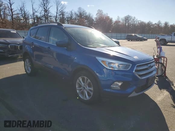 ✅ 2017 Ford Escape SE • VIN: 1FMCU9GD9HUE83194 • Lot: 91211475. Listed on Copart with 115,551 mi. Free auction sales archive from the USA and detailed vehicle history report at DreamBid. Image 4.