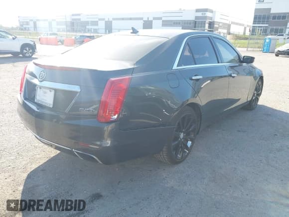 ✅ 2014 Cadillac CTS Luxury RWD • VIN: 1G6AR5SX5E0193905 • Lot: 43399010. Listed on IAAI with 115,555 mi. Free auction sales archive from the USA and detailed vehicle history report at DreamBid. Image 6.