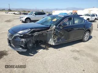 ✅ 2015 Mazda 6 i Sport • VIN: JM1GJ1U55F1203587 • Lot: 82286045. Listed on Copart with Not provided. Free auction sales archive from the USA and detailed vehicle history report at DreamBid. Image 1.