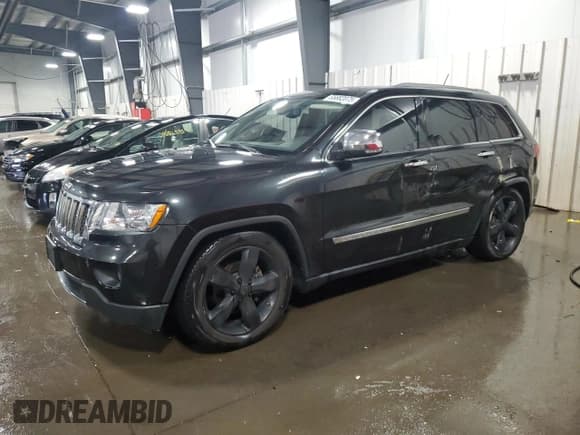 ✅ 2012 Jeep Grand Cherokee Overland • VIN: 1C4RJFCG0CC200346 • Lot: 85882075. Listed on Copart with 161,948 mi. Free auction sales archive from the USA and detailed vehicle history report at DreamBid. Image 1.