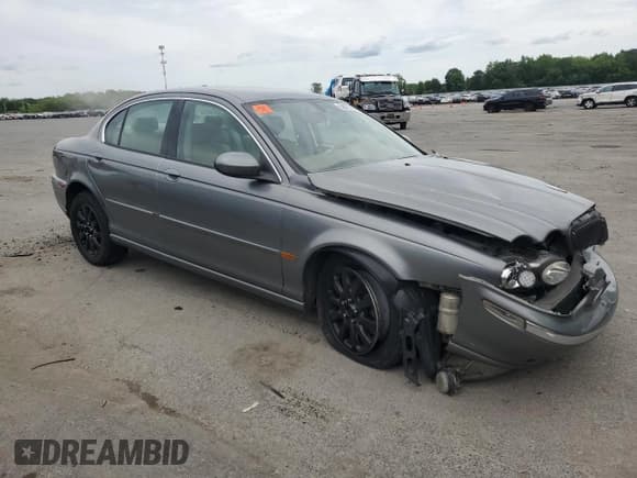 ✅ 2003 Jaguar X-Type • VIN: SAJEB52D33XD54978 • Lot: 58027805. Listed on Copart with Not provided. Free auction sales archive from the USA and detailed vehicle history report at DreamBid. Image 4.