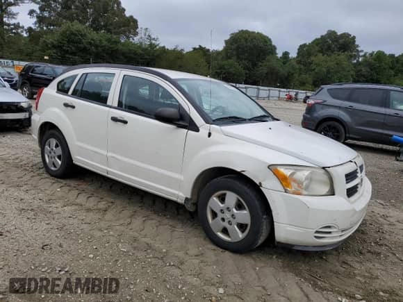 2007 Dodge Caliber with VIN 1B3HB28B87D218447, listed as a Copart auction lot 73716694 with 173,201 mi miles and Salvage title. Bid and sale history available at DreamBid. Image 4.