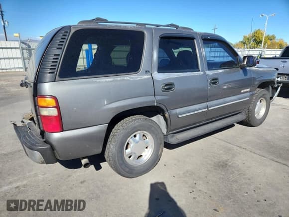 ✅ 2002 Chevrolet Tahoe LS • VIN: 1GNEK13V42J322299 • Lot: 87406305. Listed on Copart with 245,929 mi. Free auction sales archive from the USA and detailed vehicle history report at DreamBid. Image 3.
