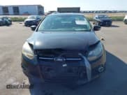 ✅ 2014 Ford Focus Titanium • VIN: 1FADP3J23EL237429 • Lot: 43358765. Listed on IAAI with 138,960 mi. Free auction sales archive from the USA and detailed vehicle history report at DreamBid. Image 12.