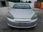 2008 Hyundai Tiburon GS с VIN KMHHM66D68U288062, выставлен на аукционе Copart как лот 58261695 с пробегом 130 310 миль миль и Чистый • Clean title. История ставок и продаж доступна на DreamBid. Изображение 5.