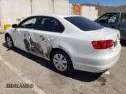 ✅ 2012 Volkswagen Jetta S • VIN: 3VW2K7AJ2CM328795 • Lot: 70914125. Listed on Copart with 72,057 mi. Free auction sales archive from the USA and detailed vehicle history report at DreamBid. Image 2.