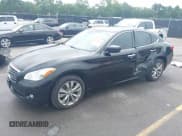 ✅ 2013 Infiniti M • VIN: JN1BY1AR2DM601917 • Lot: 42955420. Listed on IAAI with 260,658 mi. Free auction sales archive from the USA and detailed vehicle history report at DreamBid. Image 2.