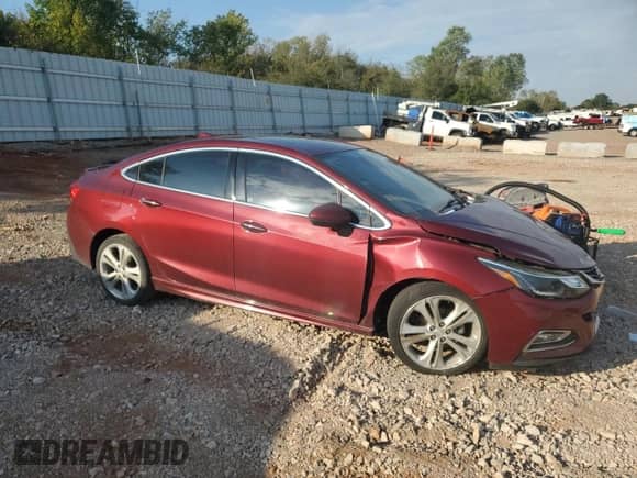 2016 Chevrolet Cruze Premier with VIN 1G1BG5SM1G7305910, listed as a Copart auction lot 86592965 with 127,901 mi miles and Salvage title. Bid and sale history available at DreamBid. Image 4.