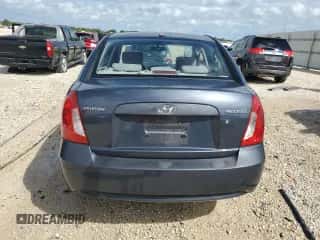 2009 Hyundai Accent Auto GLS z VIN KMHCN46C59U302439, wystawiony jako Copart lot #73185974 z przebiegiem 97 742 mil mil oraz Szkoda całkowita • Salvage title. Historia ofert i sprzedaży dostępna na DreamBid. Obrazek 6.