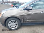 ✅ 2015 Cadillac SRX Luxury Collection • VIN: 3GYFNEE37FS630377 • Lot: 43601597. Wystawiony na IAAI z przebiegiem 81 841 mil. Bezpłatny archiwum sprzedaży aukcyjnych z USA i szczegółowy raport historii pojazdu na DreamBid. Zdjęcie 6.