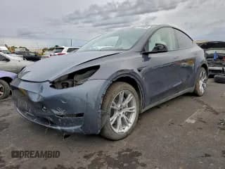 ✅ 2023 Tesla Model Y Long Range • VIN: 7SAYGDEE3PF714262 • Lot: 94197075. Listed on Copart with 13,670 mi. Free auction sales archive from the USA and detailed vehicle history report at DreamBid. Image 1.