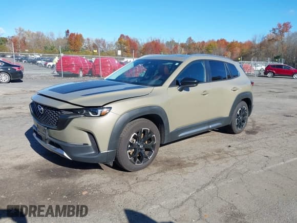 ✅ 2024 Mazda CX-50 Meridian Edition • VIN: 7MMVABXYXRN210261 • Lot: 43602371. Wystawiony na IAAI z przebiegiem 24 813 mil. Bezpłatny archiwum sprzedaży aukcyjnych z USA i szczegółowy raport historii pojazdu na DreamBid. Zdjęcie 2.