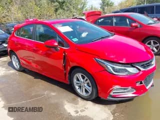✅ 2018 Chevrolet Cruze LT • VIN: 3G1BE6SM9JS652308 • Lot: 43371513. Listed on IAAI with 62,147 mi. Free auction sales archive from the USA and detailed vehicle history report at DreamBid. Image 1.