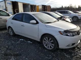 ✅ 2011 Kia Forte SX • VIN: KNAFW4A31B5384513 • Lot: 90573055. Listed on Copart with 111,089 mi. Free auction sales archive from the USA and detailed vehicle history report at DreamBid. Image 4.