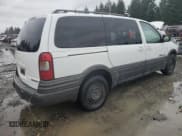 ✅ 2002 Pontiac Montana 1SA • VIN: 1GMDX03E42D144436 • Lot: 91132275. Wystawiony na Copart z przebiegiem 292 009 mil. Bezpłatny archiwum sprzedaży aukcyjnych z USA i szczegółowy raport historii pojazdu na DreamBid. Zdjęcie 3.