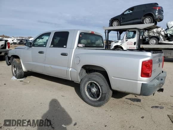 2007 Dodge Dakota ST with VIN 1D7HW28K27S250766, listed as a Copart auction lot 82396164 with Not provided miles and Salvage title. Bid and sale history available at DreamBid. Image 2.