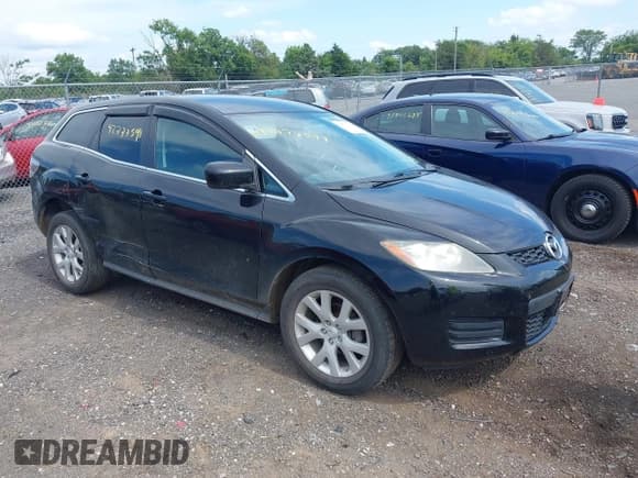 ✅ 2009 Mazda CX-7 Sport • VIN: JM3ER29L190217033 • Lot: 42777594. Listed on IAAI with 158,434 mi. Free auction sales archive from the USA and detailed vehicle history report at DreamBid. Image 1.
