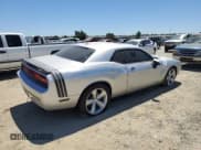 ✅ 2010 Dodge Challenger SRT-8 • VIN: 2B3CJ7DW6AH224227 • Lot: 64713084. Wystawiony na Copart z przebiegiem 141 431 mil. Bezpłatny archiwum sprzedaży aukcyjnych z USA i szczegółowy raport historii pojazdu na DreamBid. Zdjęcie 3.