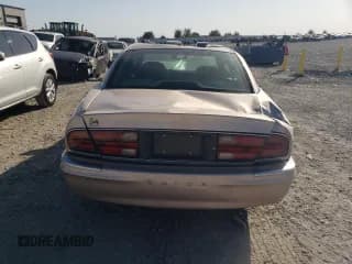 ✅ 1999 Buick Park Avenue • VIN: 1G4CW52K1X4637338 • Lot: 74958104. Listed on Copart with 79,132 mi. Free auction sales archive from the USA and detailed vehicle history report at DreamBid. Image 6.