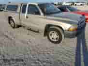 2004 Dodge Dakota with VIN 1D7GL12K94S627063, listed as a Copart auction lot 75315764 with 202,412 mi miles and Salvage title. Bid and sale history available at DreamBid. Image 4.