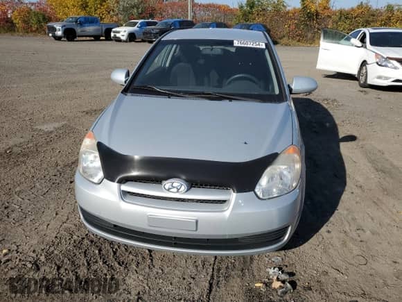 2009 Hyundai Accent L z VIN KMHCN35C69U143104, wystawiony jako Copart lot #76607254 z przebiegiem 145 844 mil mil oraz Szkoda całkowita • Salvage title. Historia ofert i sprzedaży dostępna na DreamBid. Obrazek 5.