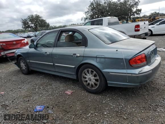 2004 Hyundai Sonata GLS z VIN KMHWF35H54A045598, wystawiony jako Copart lot #86837924 z przebiegiem Nie podano mil oraz Szkoda całkowita • Salvage title. Historia ofert i sprzedaży dostępna na DreamBid. Obrazek 2.