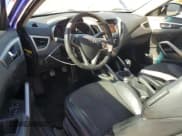 ✅ 2012 Hyundai Veloster w/Gray Int • VIN: KMHTC6ADXCU043701 • Lot: 86264514. Wystawiony na Copart z przebiegiem 152 420 mil. Bezpłatny archiwum sprzedaży aukcyjnych z USA i szczegółowy raport historii pojazdu na DreamBid. Zdjęcie 8.