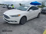 ✅ 2017 Ford Fusion Hybrid Titanium • VIN: 3FA6P0RU4HR250242 • Лот: 43224550. Опубликован ранее на IAAI с пробегом 178 522 миль. Бесплатный доступ к архиву аукционных продаж из США и подробный отчёт об истории автомобиля на DreamBid. Изображение 17.