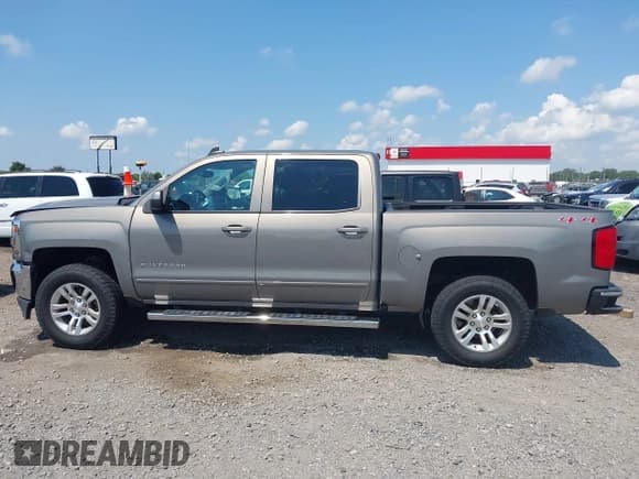 ✅ 2017 Chevrolet Silverado 1500 LT • VIN: 3GCUKREH8HG322388 • Лот: 42586115. Опубликован ранее на IAAI с пробегом 98 627 миль. Бесплатный доступ к архиву аукционных продаж из США и подробный отчёт об истории автомобиля на DreamBid. Изображение 14.