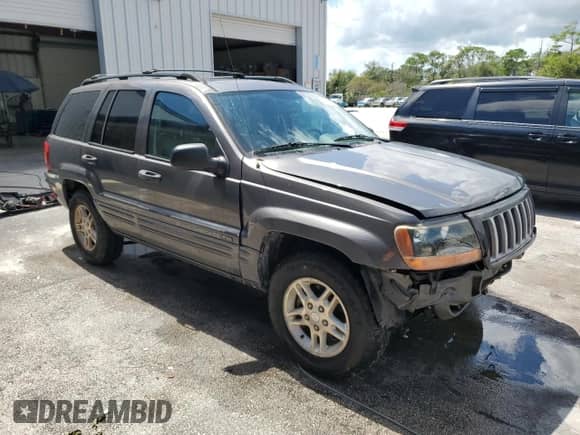 2004 Jeep Grand Cherokee Laredo с VIN 1J4GX48S54C381804, выставлен на аукционе Copart как лот 84025475 с пробегом 130 694 миль миль и Списание • Salvage title. История ставок и продаж доступна на DreamBid. Изображение 4.