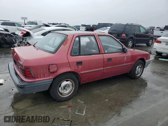✅ 1992 Plymouth Sundance • VIN: 1P3XP28D4NN165248 • Lot: 44205855. Listed on Copart with 70,897 mi. Free auction sales archive from the USA and detailed vehicle history report at DreamBid. Image 4.