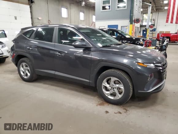 ✅ 2022 Hyundai Tucson SE • VIN: 5NMJACAE1NH079800 • Lot: 87449515. Listed on Copart with 62,447 mi. Free auction sales archive from the USA and detailed vehicle history report at DreamBid. Image 4.