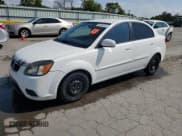 ✅ 2010 Kia Rio LX • VIN: KNADH4A35A6680550 • Лот: 80386105. Опубликован ранее на Copart с пробегом 259 120 миль. Бесплатный доступ к архиву аукционных продаж из США и подробный отчёт об истории автомобиля на DreamBid. Изображение 1.