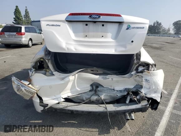 ✅ 2012 Ford Fusion Hybrid • VIN: 3FADP0L37CR270114 • Лот: 85205455. Опубликован ранее на Copart с пробегом 188 333 миль. Бесплатный доступ к архиву аукционных продаж из США и подробный отчёт об истории автомобиля на DreamBid. Изображение 6.