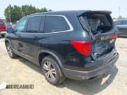 ✅ 2017 Honda Pilot EX-L • VIN: 5FNYF5H50HB018073 • Lot: 42417778. Listed on IAAI with 60,784 mi. Free auction sales archive from the USA and detailed vehicle history report at DreamBid. Image 3.