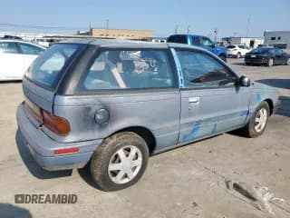 ✅ 1991 Plymouth Colt • VIN: JP3CU24A5MU016998 • Lot: 67751215. Wystawiony na Copart z przebiegiem 83 370 mil. Bezpłatny archiwum sprzedaży aukcyjnych z USA i szczegółowy raport historii pojazdu na DreamBid. Zdjęcie 3.