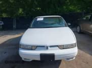 ✅ 1997 Oldsmobile Cutlass Supreme Series II • VIN: 1G3WH52M4VF327067 • Lot: 42709655. Wystawiony na IAAI z przebiegiem 176 945 mil. Bezpłatny archiwum sprzedaży aukcyjnych z USA i szczegółowy raport historii pojazdu na DreamBid. Zdjęcie 6.