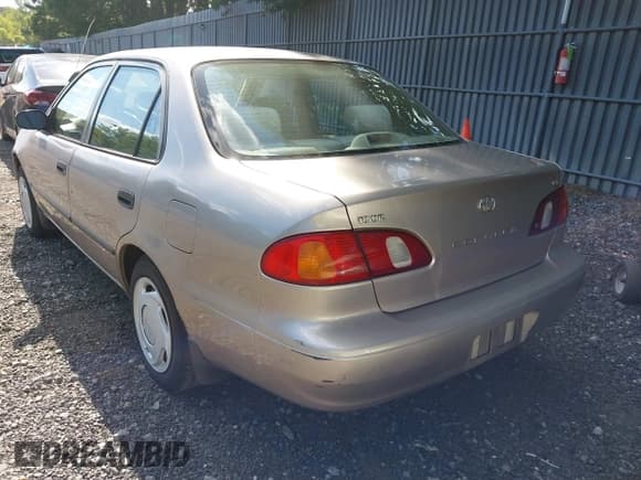 ✅ 1999 Toyota Corolla VE • VIN: 2T1BR12E1XC141396 • Lot: 42969365. Listed on IAAI with 215,831 mi. Free auction sales archive from the USA and detailed vehicle history report at DreamBid. Image 3.