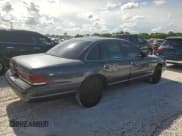✅ 1996 Ford Crown Victoria Police • VIN: 2FALP71W3TX170322 • Лот: 60784005. Опубликован ранее на Copart с пробегом 169 836 миль. Бесплатный доступ к архиву аукционных продаж из США и подробный отчёт об истории автомобиля на DreamBid. Изображение 3.