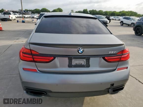 ✅ 2018 BMW 7 Series 750i • VIN: WBA7F0C52JGM23950 • Lot: 61341985. Listed on Copart with 70,268 mi. Free auction sales archive from the USA and detailed vehicle history report at DreamBid. Image 6.